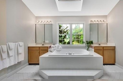 Spa bathroom with dual vanities
