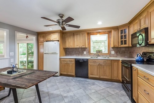Walpole kitchen with natural wood cabinets