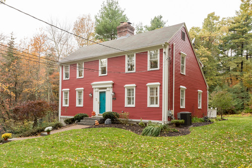 Red colonial farmhouse exterior