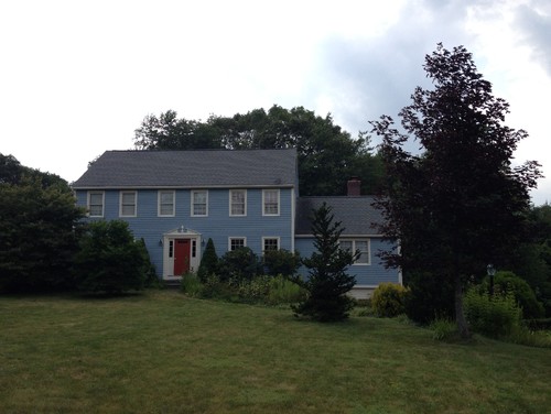Blue-gray colonial with red door