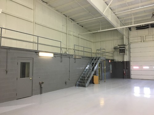 Commercial space with painted walls and epoxy floor