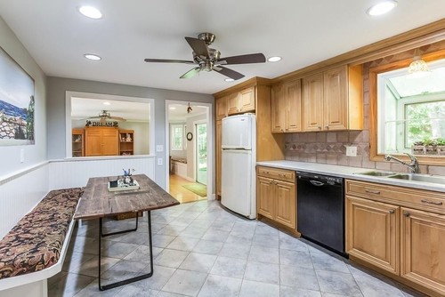 Kitchen and breakfast nook with gray walls